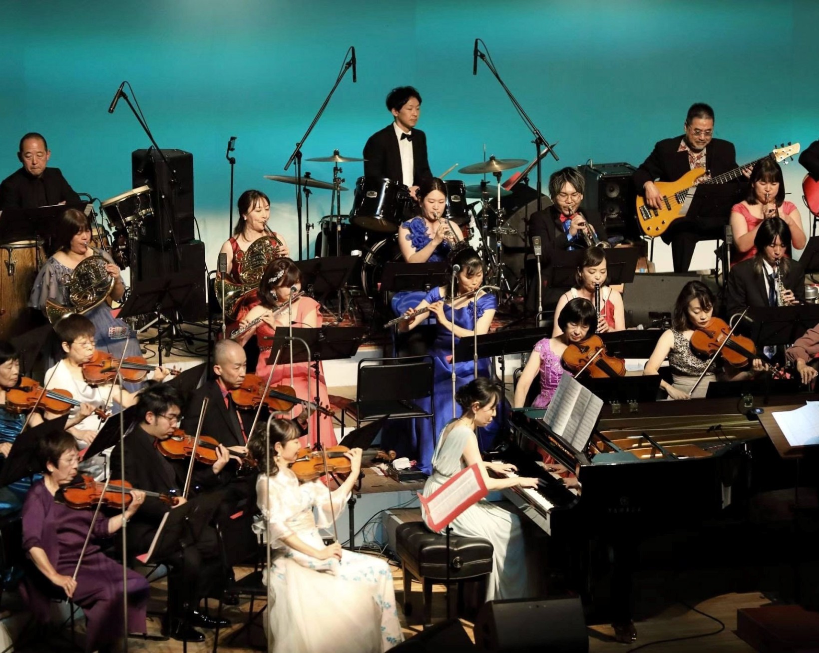 多彩な名曲をオリジナル編曲で披露する定期演奏会(2023年、高知市の市文化プラザ「かるぽーと」)